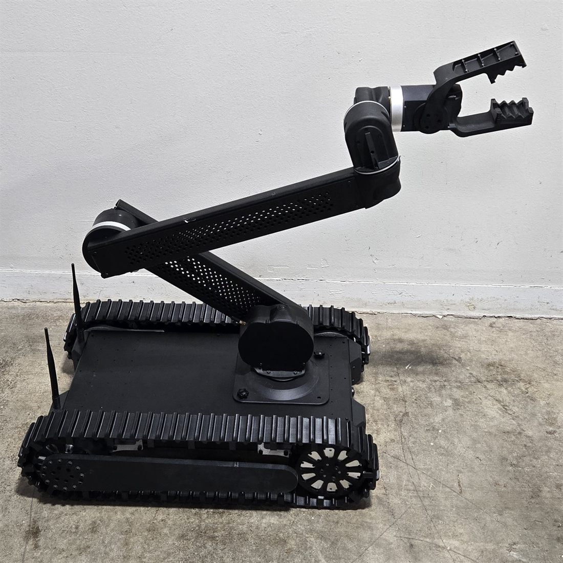 Bulldog arm raised with track detail visible