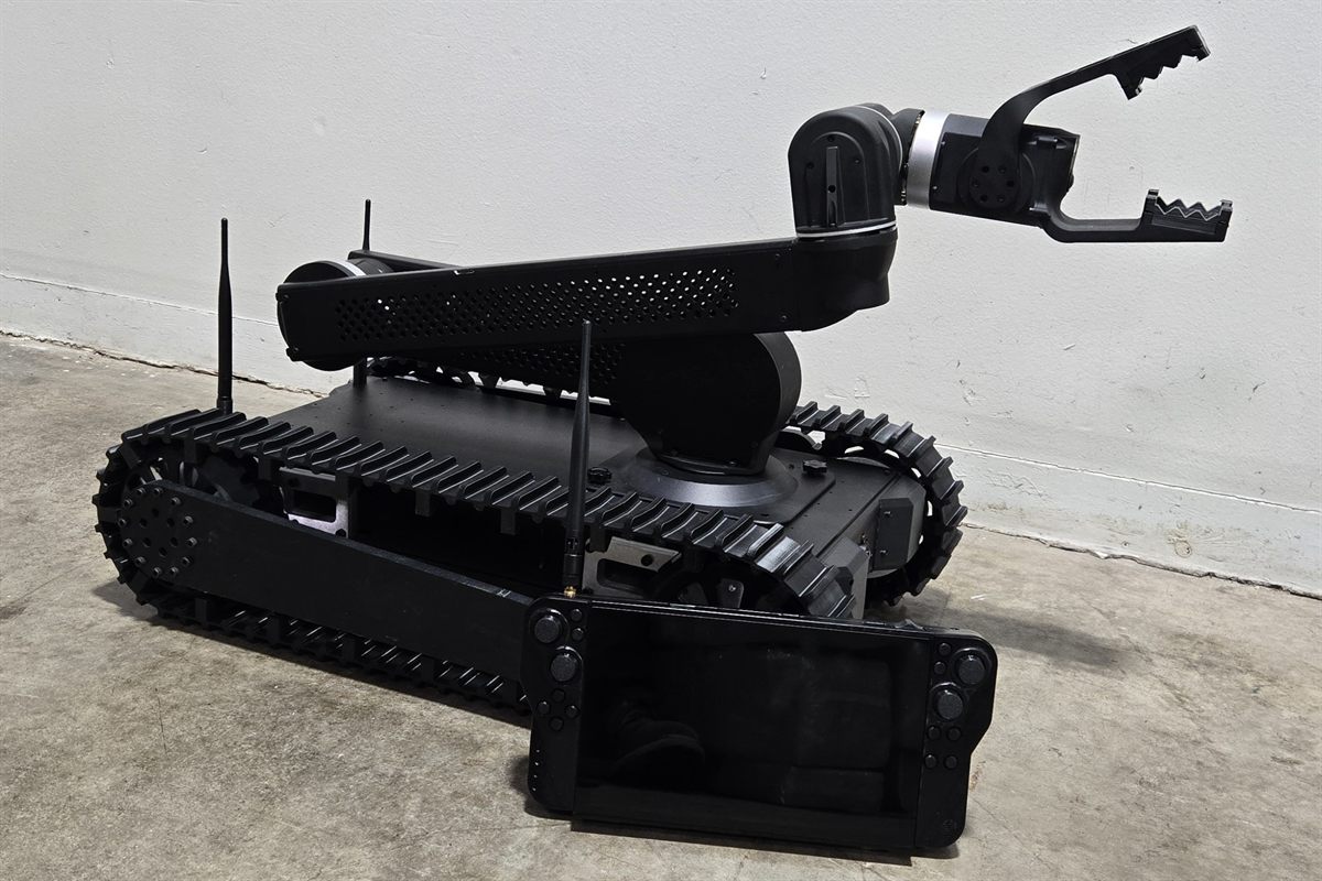 Bulldog tactical robot with the handheld operator control unit in front