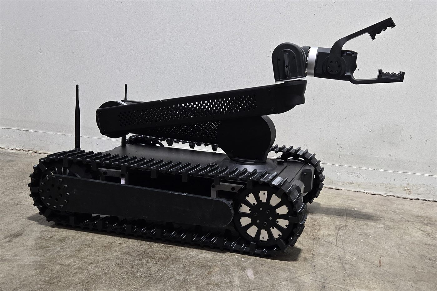 Bulldog tracked tactical support robot with removable 6-axis arm and gripper