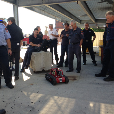 Firefighters with the Robot
