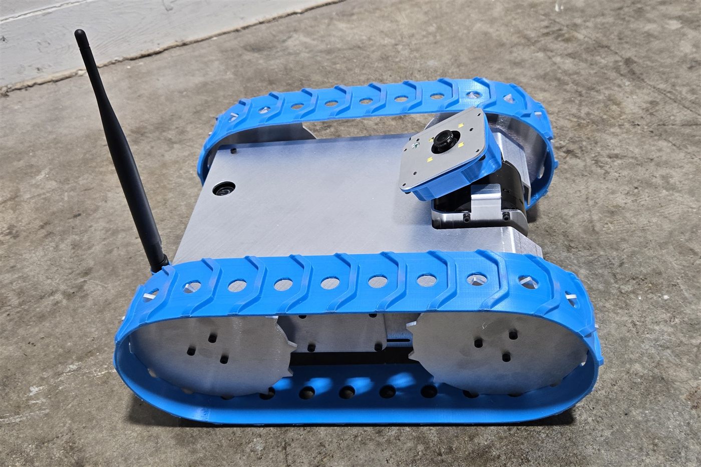 Gopher tracked crawlspace inspection robot with tilt camera and LED lights